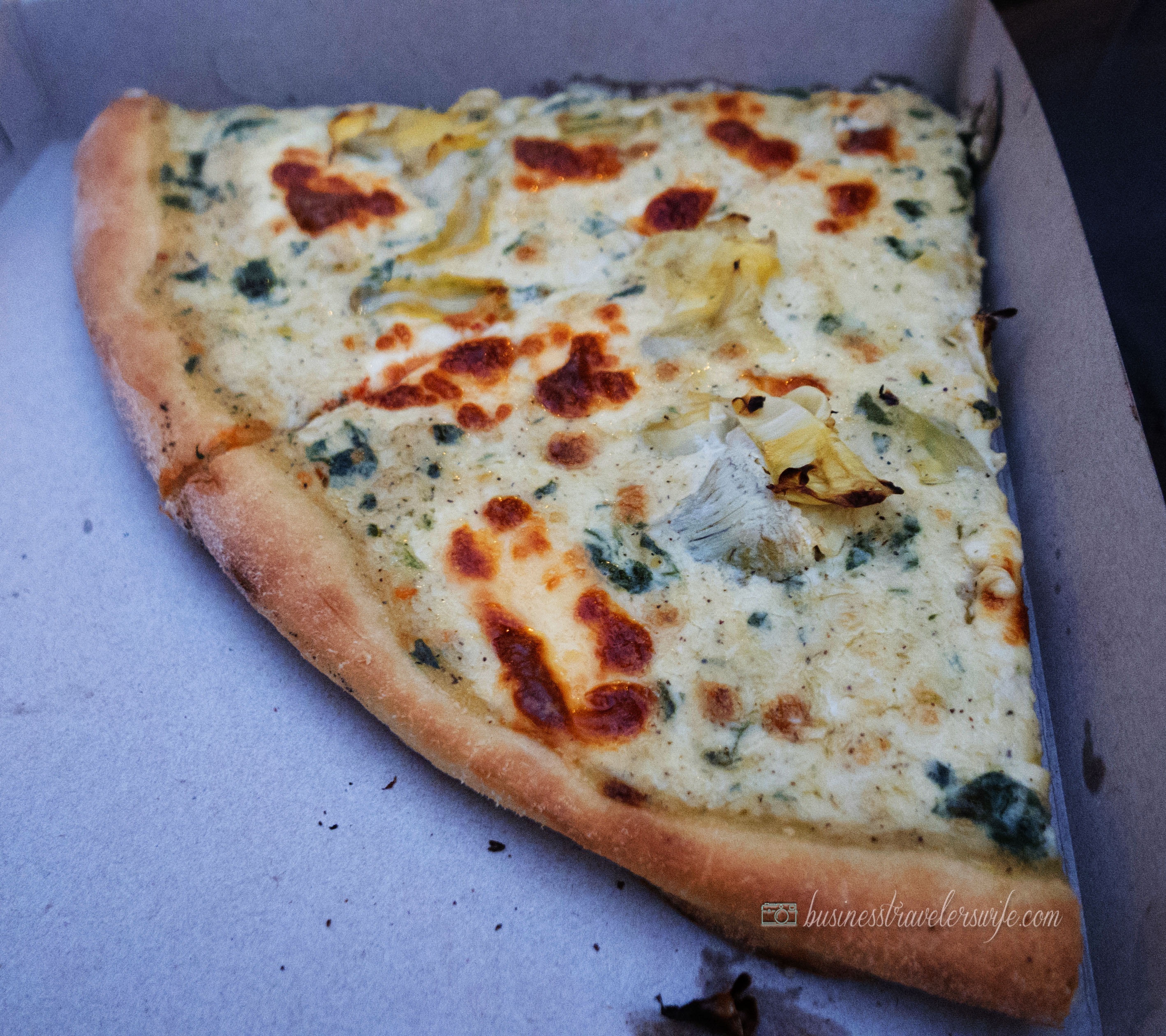 indulge like a food in NYC - what to eat in New York Bastille's Pizza Artichoke Pizza