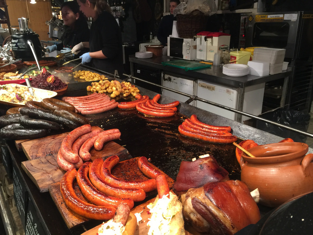10 Must-Visit Christmas Markets Around the World for Foodies Budapest Christmas Fair Grilled Sausages meat 2