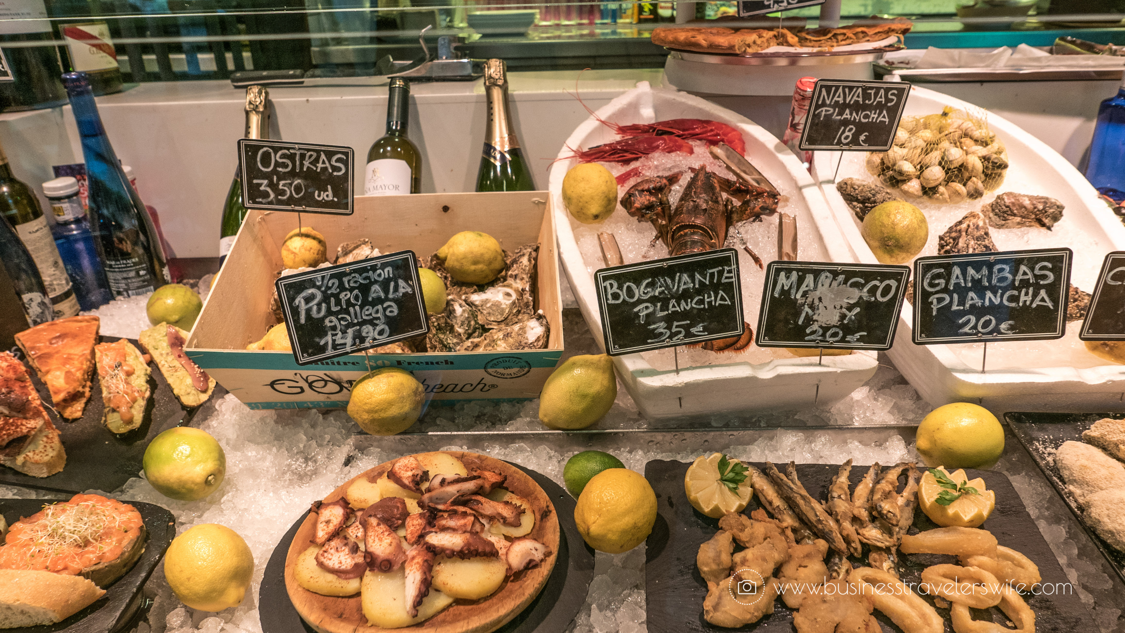 Experiencing the Best of Madrid in a Day - Explore, Eat, Stay Food Markets Mercado de San Anton seafood tapas