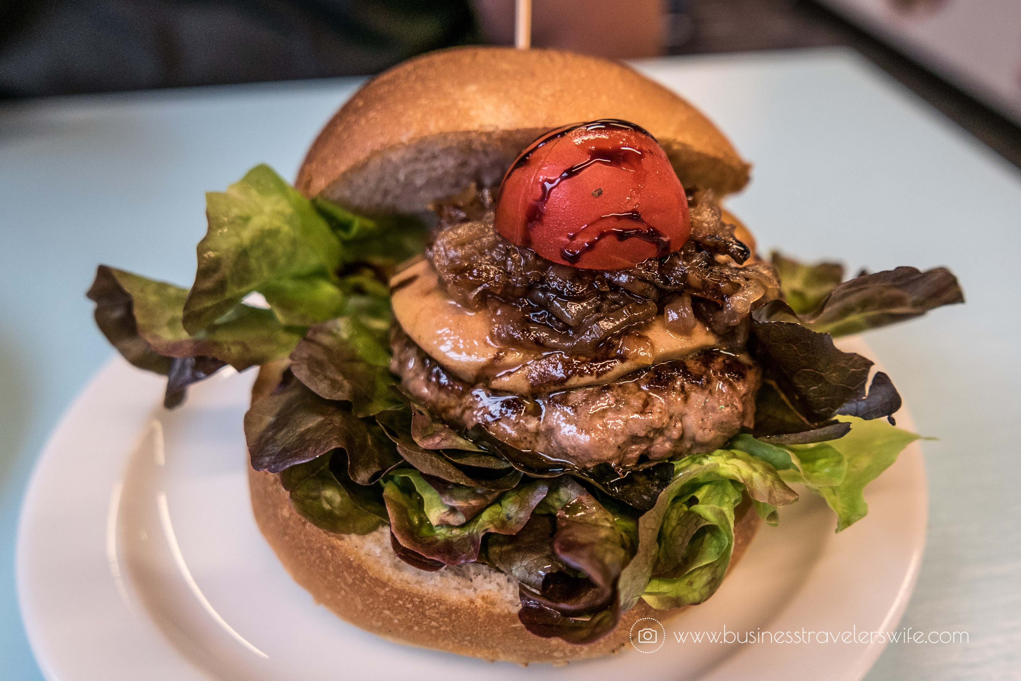 Experiencing the Best of Madrid in a Day - Explore, Eat, Stay Food Markets Mercado de San Anton tapas Hamburguesa de Buey con Foie Caramelizado