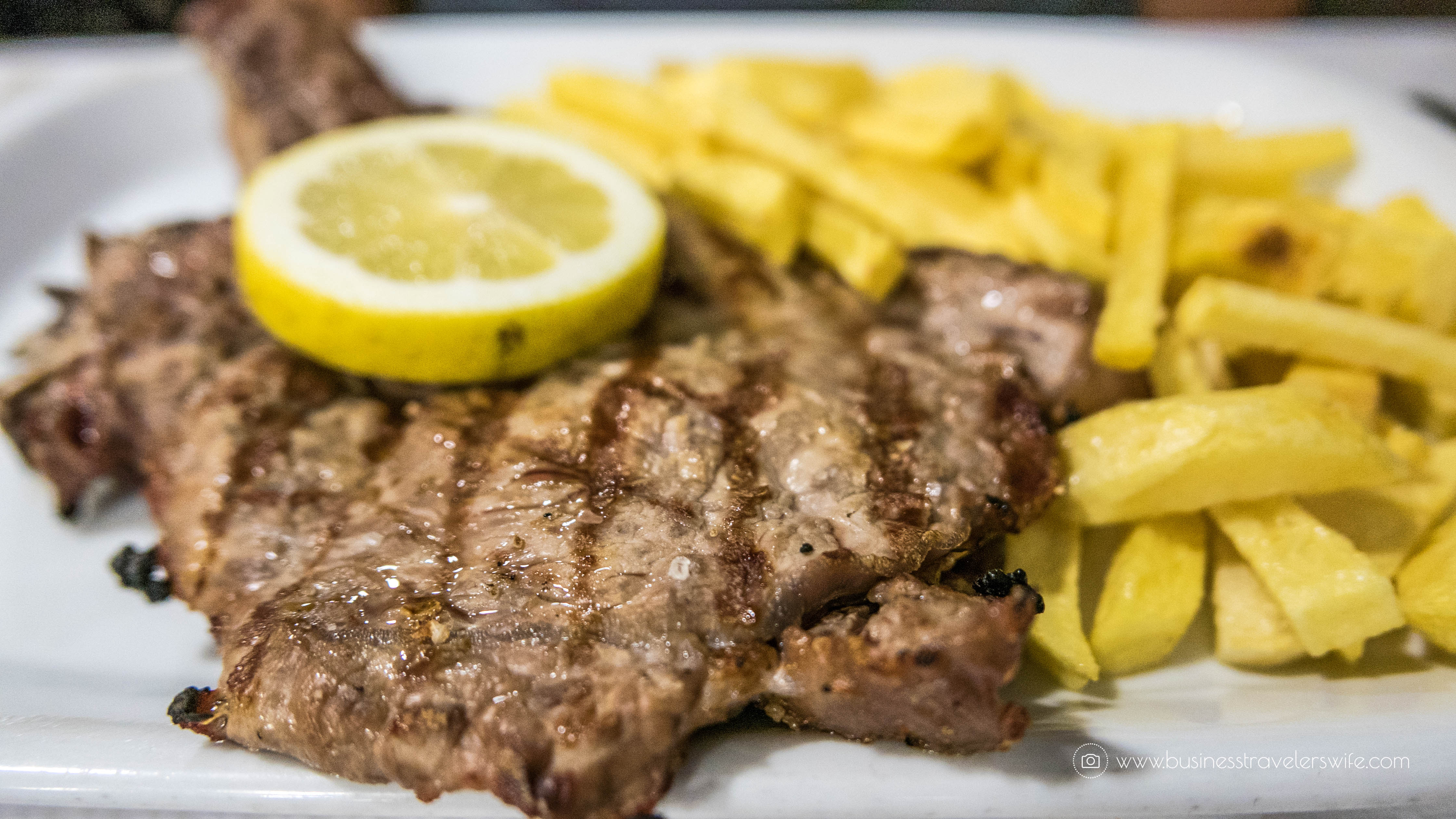 15 Travel Tips for Your First Trip to Lisbon Portugal Restaurante Papo Cheio Bacalhau Bitoque Fried Steak and Fries