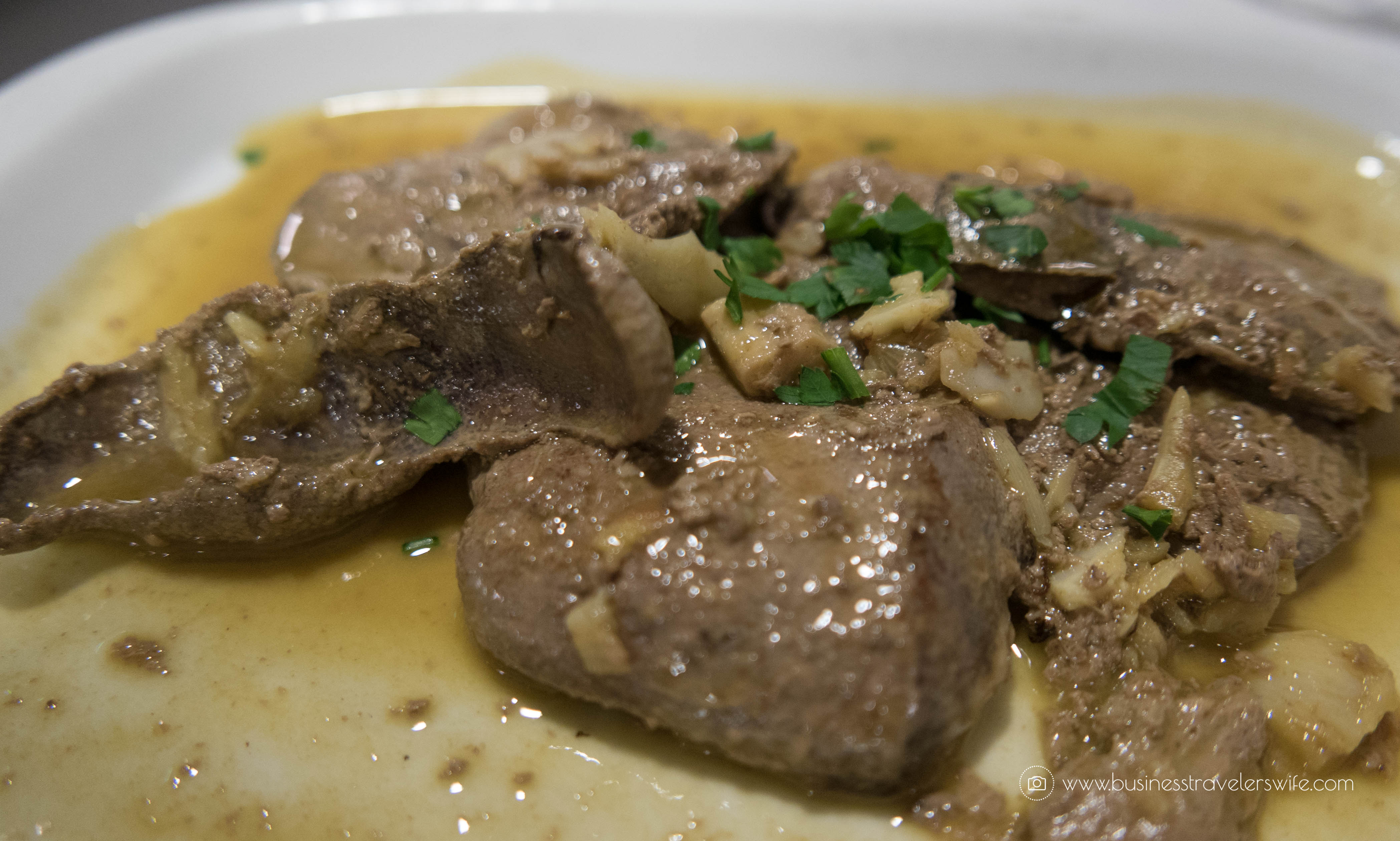 15 Travel Tips for Your First Trip to Lisbon Portugal Restaurante Papo Cheio fried liver with garlic