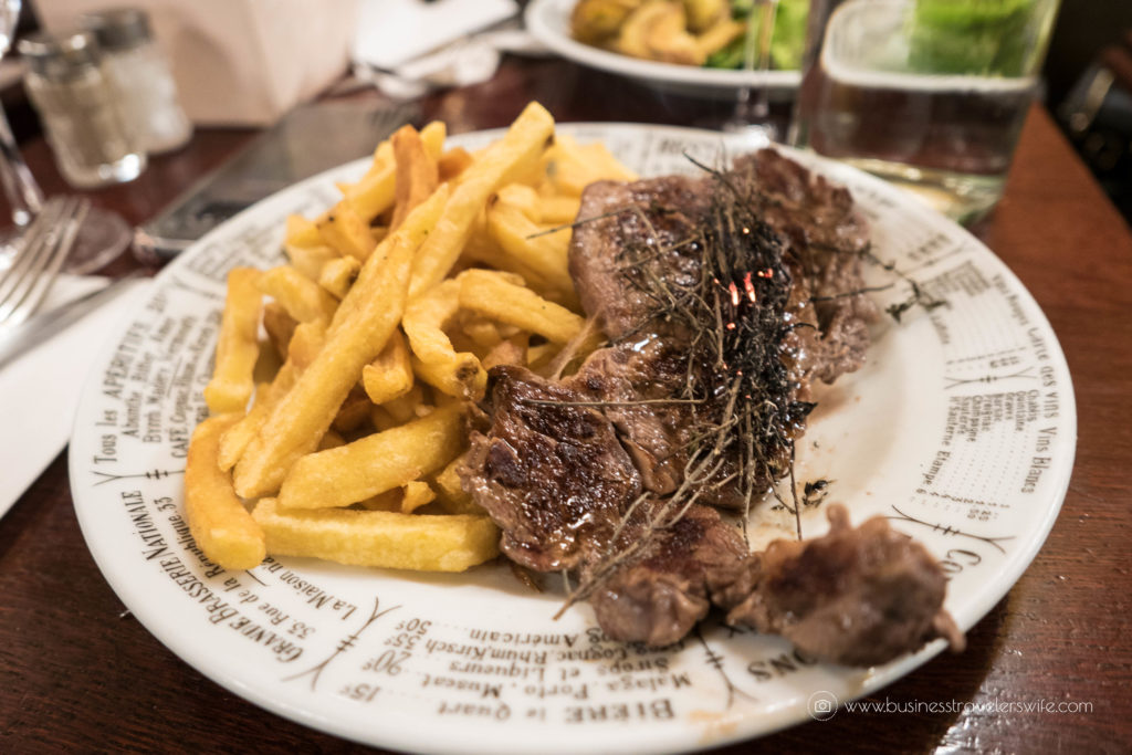 Our List of Must-Try Foods in Paris Bistrot Victoires beef ribeye steak burning wild thyme