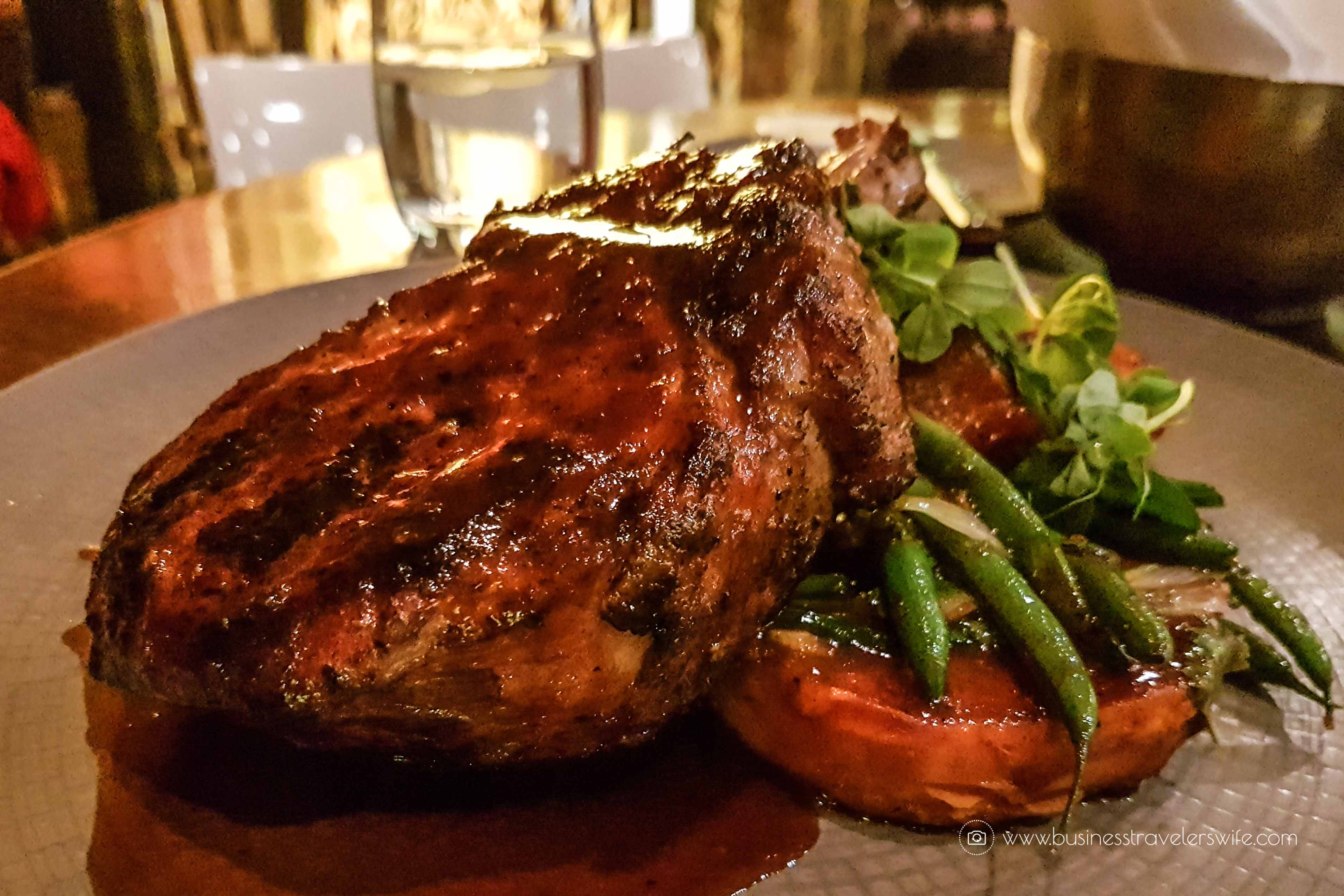 Las Vegas Travel Hack Using myVEGAS Rewards and Hotel Comps Wolfgang Puck Bar & Grill Double Cut Pork Chop with Pineapple Hoisin-Glaze